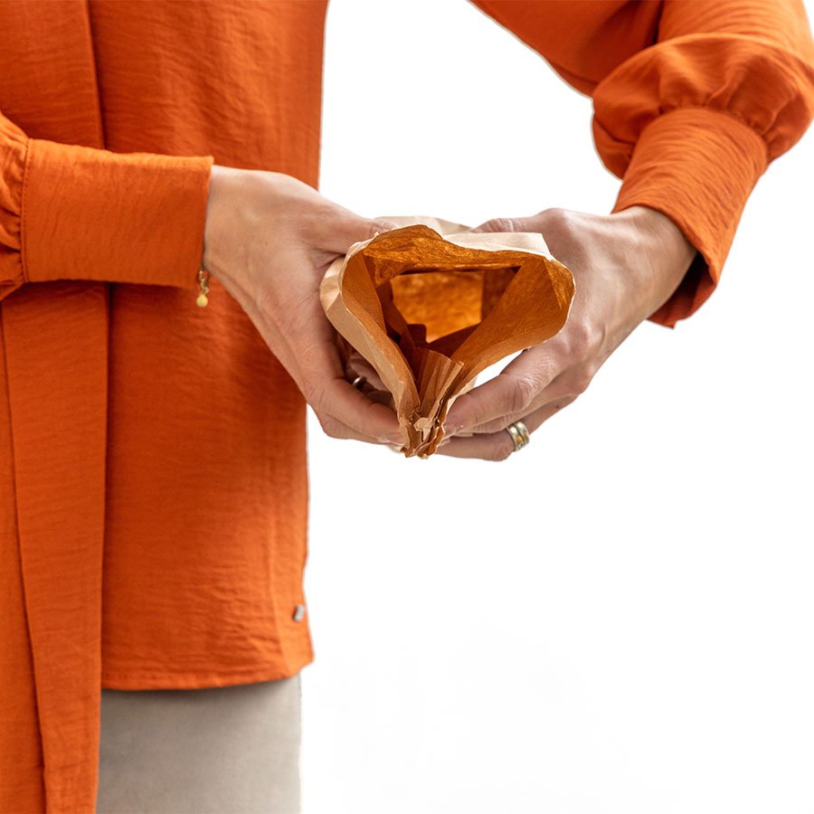 Puffer gegen Stöße und Druck dank dreieckigem Hohlraum des Papiers Puffer gegen Stöße und Druck dank dreieckigem Hohlraum des Papiers