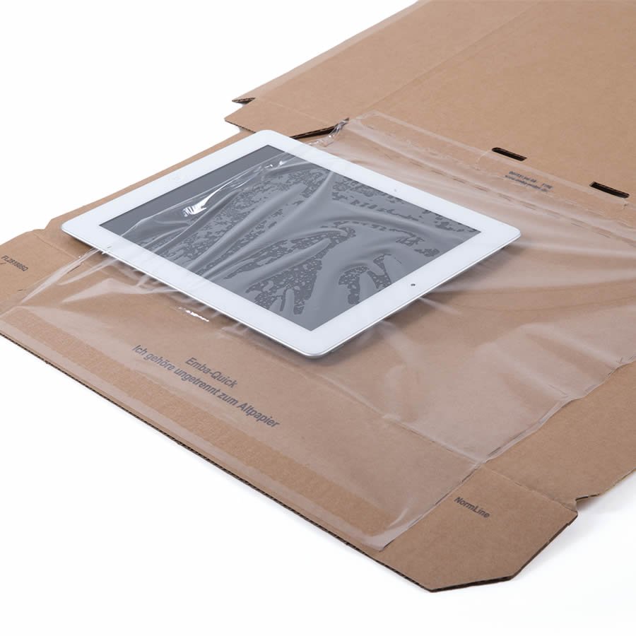 Das Packgut wird in die Folie eingelegt. Das Packgut wird in die Folie eingelegt.